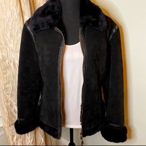 Suede and leather faux fur coat.